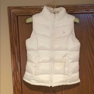 Girl’s white puffy vest